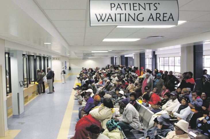 Patients wait to collect medication at Chris Hani Baragwanath Hospital Picture: Lucky Morajane / Daily Sun / Gallo Images