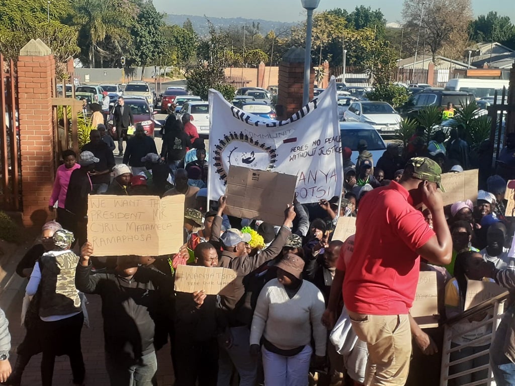 Diepsloot residents outside Randburg Magistrate's Court to support their leaders. 