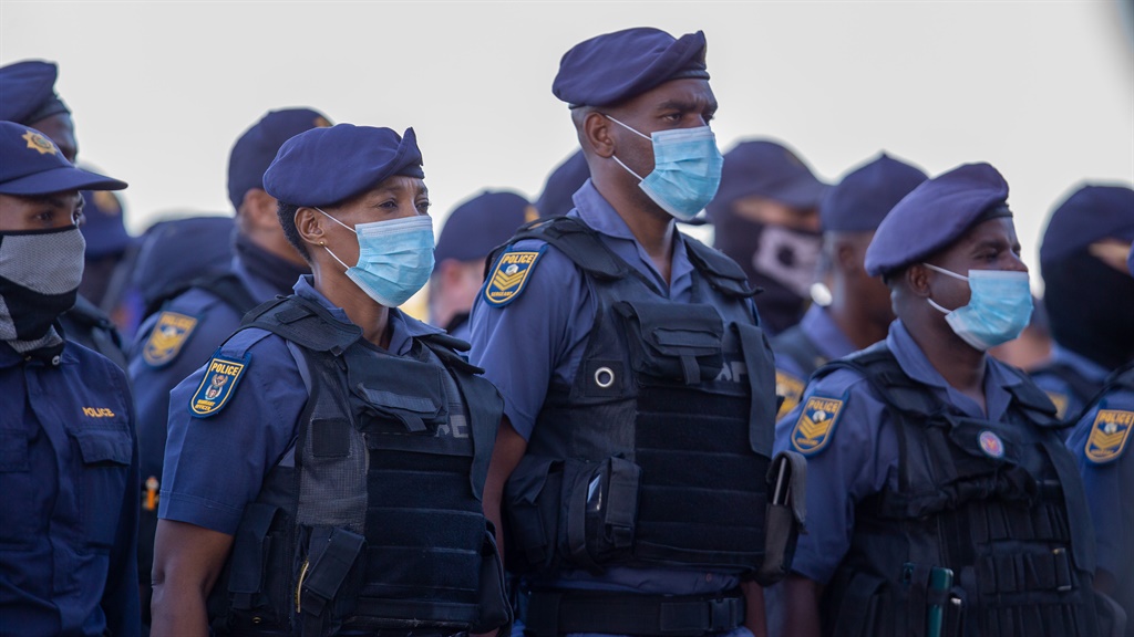 Police Minister Bheki Cele addresses members of the South African Police Service at a parade at 35 Squadron in Cape Town after government declared a 21 day Covid-19 lockdown. (Gallo Images)