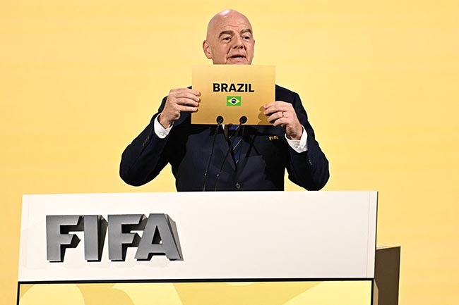 FIFA president Gianni Infantino announces Brazil as the hosts of the 2027 Women's World Cup during the 74th FIFA Congress in Bangkok on 17 May 2024. (Manan VATSYAYANA/AFP)