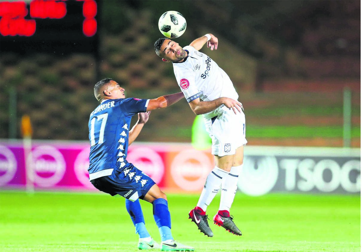Chris David of Cape Town City is challenged by Cole Alexander of Bidvest Wits during their Absa Premiership match at Bidvest Stadium last night                                                                                                                   Picture: Samuel Shivambu / BackpagePix