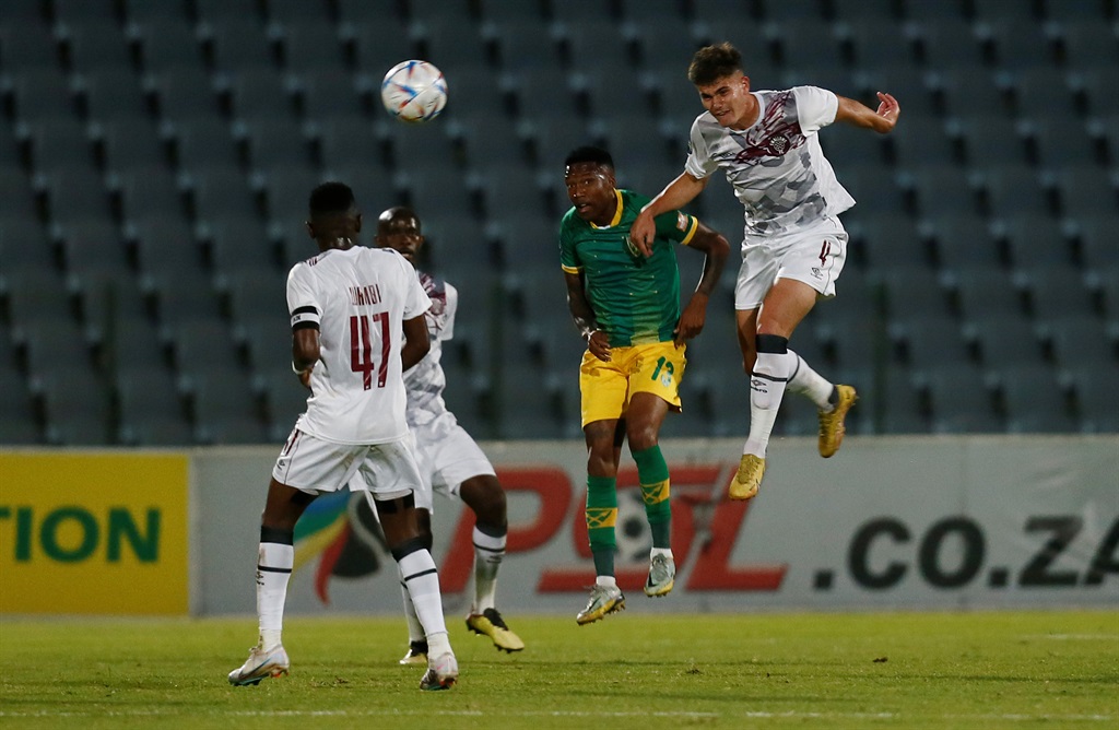 JOHANNESBURG, SOUTH AFRICA - MARCH 17: Keegan Allan of Swallows FC in action with Pule Mmodi of Golden Arrows during the DStv Premiership match between Swallows FC and Golden Arrows at Dobsonville Stadium on March 17, 2023 in Johannesburg, South Africa. (Photo by Gallo Images)