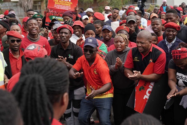 EFF supporters gather in a parking lot outside CPUT in Cape Town central. (Photo: Luke Daniel, News24)