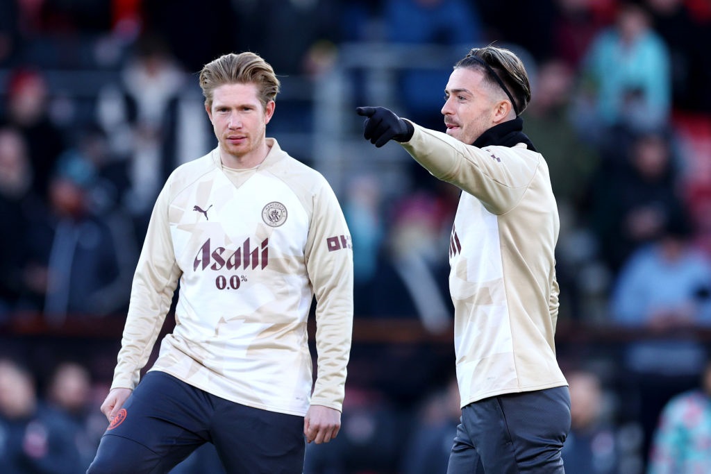BOURNEMOUTH, ENGLAND - FEBRUARY 24: Kevin De Bruyne and Jack Grealish of Manchester City react prior to the Premier League match between AFC Bournemouth and Manchester City at the Vitality Stadium on February 24, 2024 in Bournemouth, England. (Photo by Clive Rose/Getty Images)