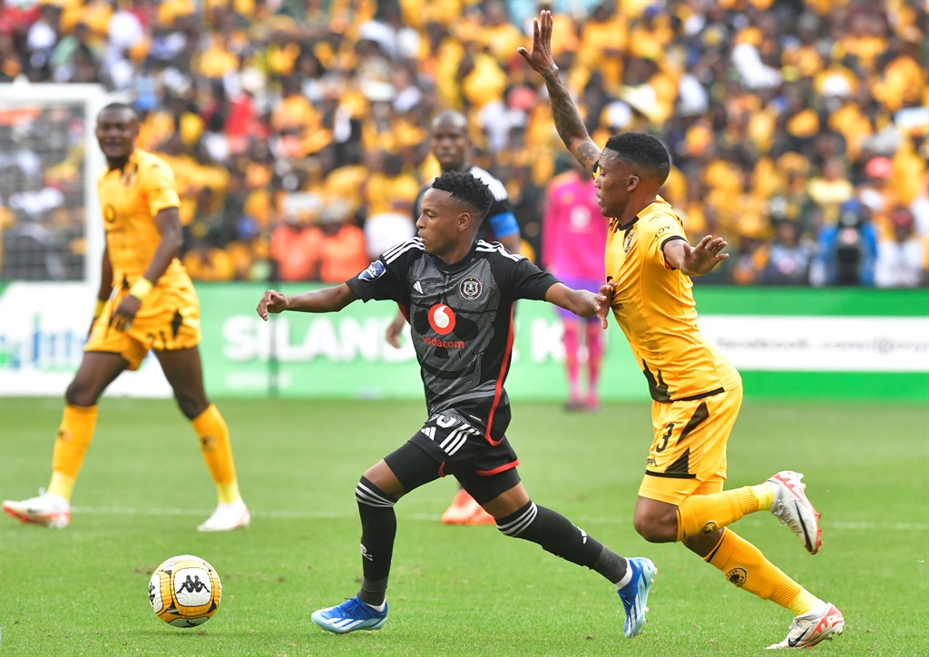 Pule Mmodi of Kaizer Chiefs and Relebohile Mofokeng of Orlando Pirates during the DStv Premiership match between Kaizer Chiefs and Orlando Pirates at FNB Stadium on November 11, 2023 in Johannesburg, South Africa. 