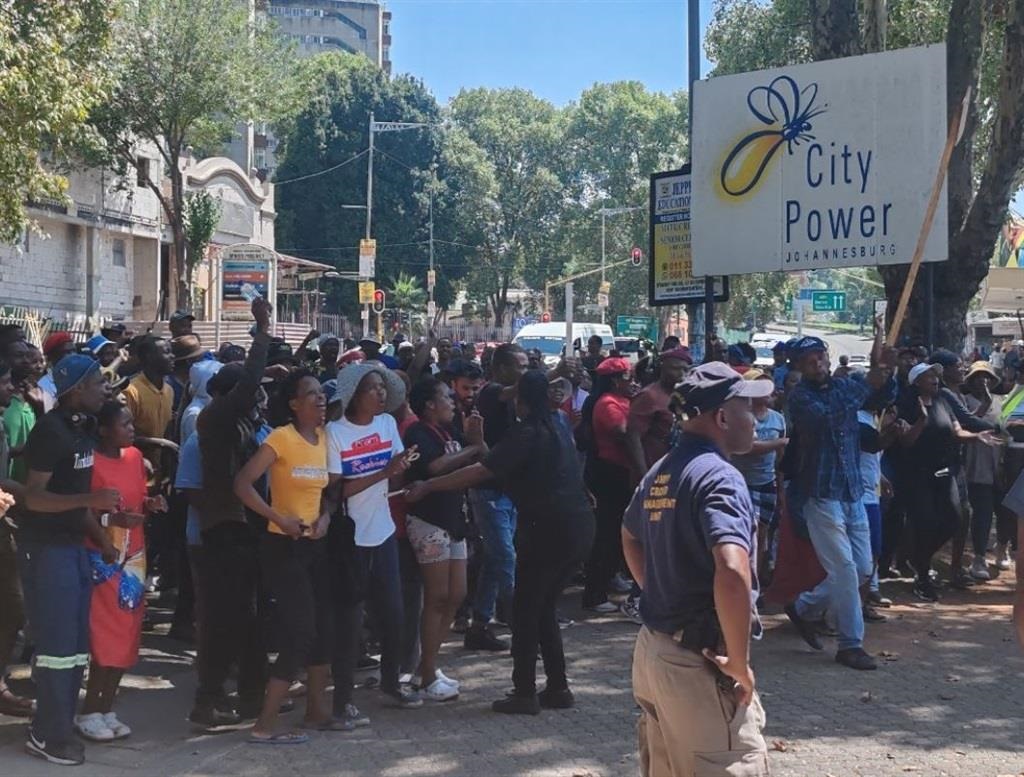 Residents of Yeoville and surrounding areas in the inner city of Joburg during their silent walk to City Power. 