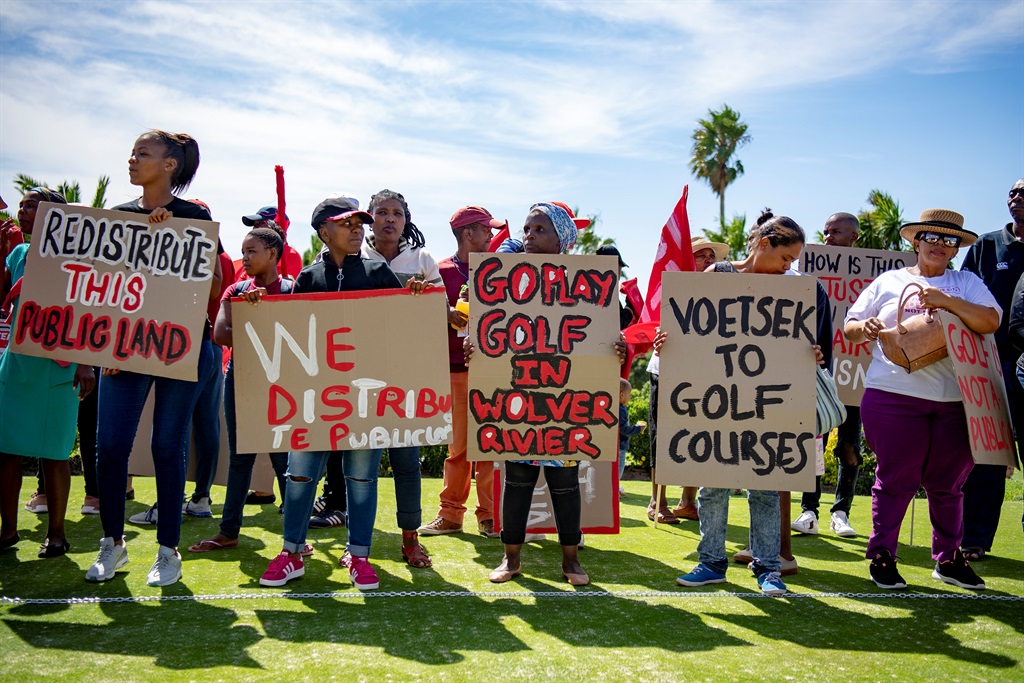 Activists from ‘Reclaim the City’ civil rights group occupy the Rondebosch Golf Course, calling for the club to be converted into social housing.
