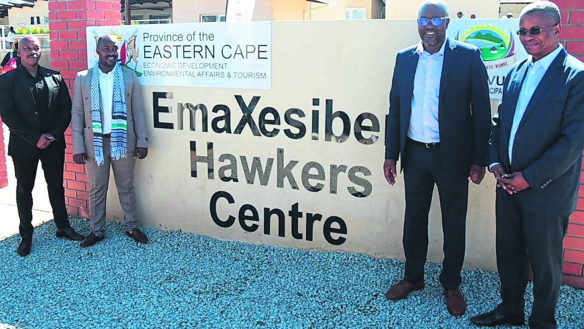 Eastern Cape DEDEAT MEC Mlungisi Mvoko, right, together with ECDC’s Darwin Nkonki, far right, Alfred Nzo District Municipality executive mayor Vukile Mhlelembana, and Umzimvubu Local Municipality acting mayor Inga Nodali, during the official opening of the eMaxesibeni Hawkers Centre.                               