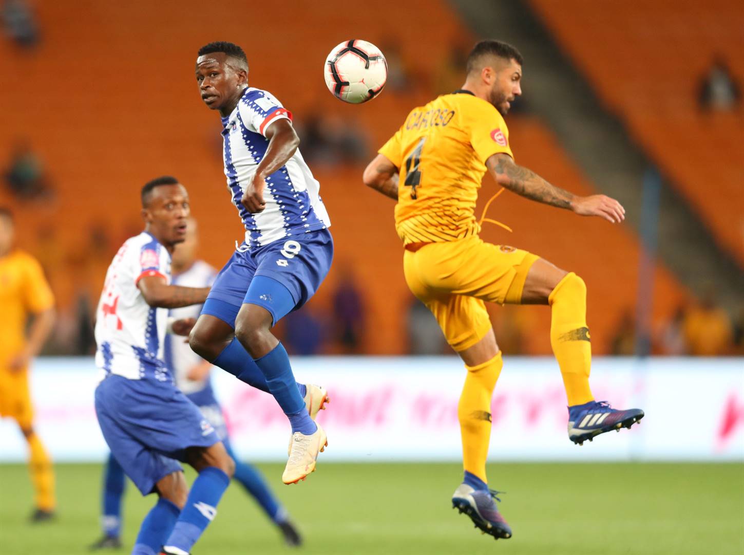 Siphesihle Ndlovu of Maritzburg United and Daniel Cardoso of Kaizer Chiefs seem to be engaged in some crazy dance rather than a football match during the two sides’ Absa Premiership match at FNB Stadium last evening. Picture: Samuel Shivambu / BackpagePix