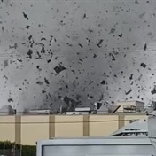WATCH | Rare tornado near Los Angeles rips building roofs