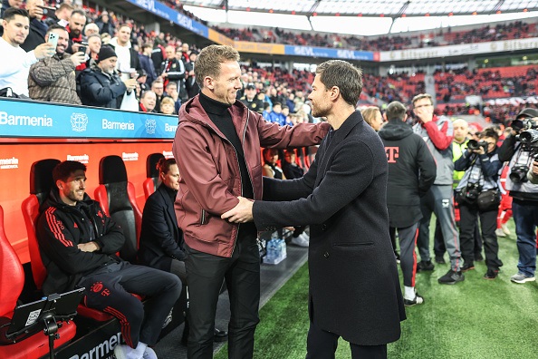 Bayer Leverkusen boss Xabi Alonso (right) is reportedly Real Madrid president Florentino Perez's preferred option to replace Carlo Ancelotti.