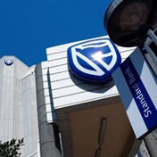 Standard Bank lifts almost 5% as it flags profit growth of over a third