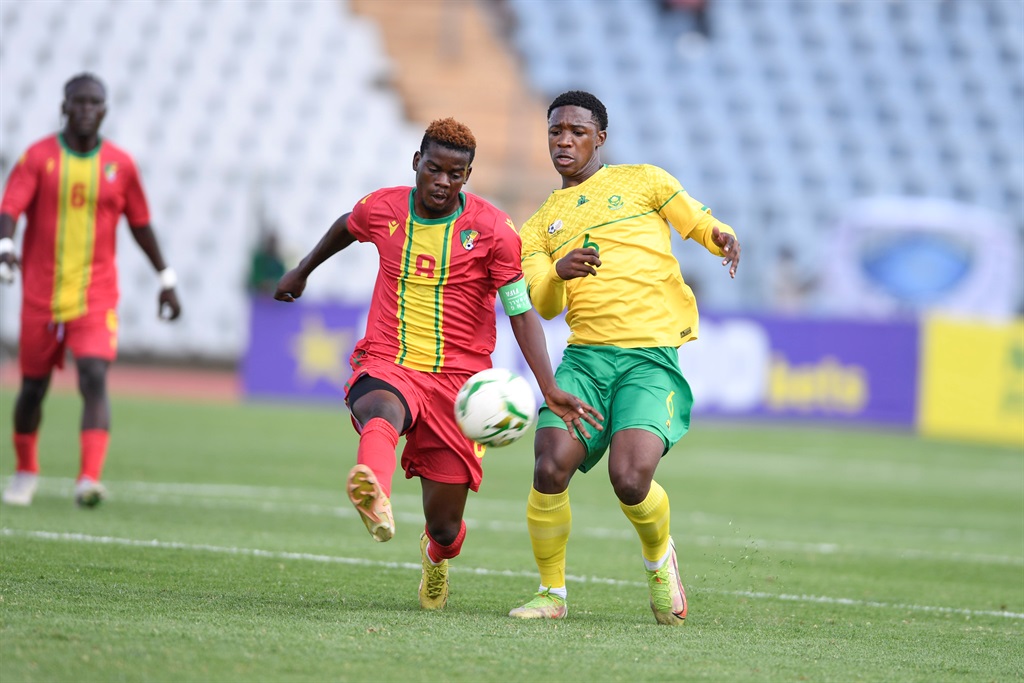 JOHANNESBURG, SOUTH AFRICA - MARCH 23: Borel Tomandzoto of Congo Brazzaville and Samkelo Zwane of South Africa during the U23 Africa Cup of Nations, Qualifier match between South Africa and Congo Brazzaville at Donsonville Stadium on March 23, 2023 in Johannesburg, South Africa. (Photo by Lefty Shivambu/Gallo Images)