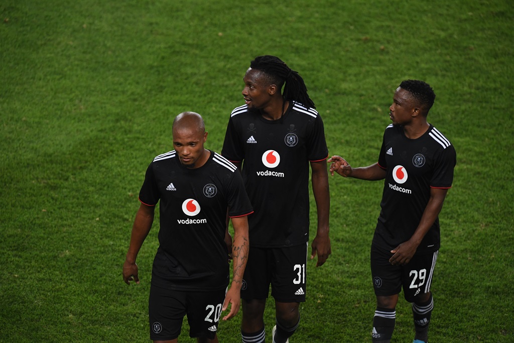 Goodman Mosele ,Olisa Ndah and Paseka Mako of Orlando Pirates during the CAF Confederation Cup match between Orlando Pirates and Royal Leopards at Orlando Stadium on March 13, 2022 in Johannesburg, South Africa. 
