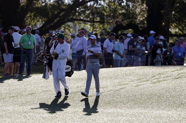 Justin Harding and caddie Alan Burns saw stars on the first day of the 2019 Masters golf tournament at the Augusta National Golf Club, where Harding took an early lead. Picture: Lucy Nicholson/Reuters
