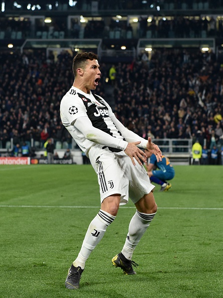 Cristiano Ronaldo of Juventus  celebrates the victory at the end of the UEFA Champions League Round of 16 Second Leg match between Juventus and Club de Atletico Madrid at Allianz Stadium