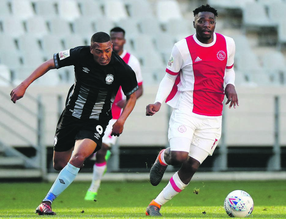 Gavin Hammers of Cape Umoya United goes toe-to-toe with Ajax Cape Town defender Thendo Mukumela in their previous meeting. The two NFD clubs face off in the second instalment of the Cape derby this afternoon. Picture: Chris Ricco / BackpagePix