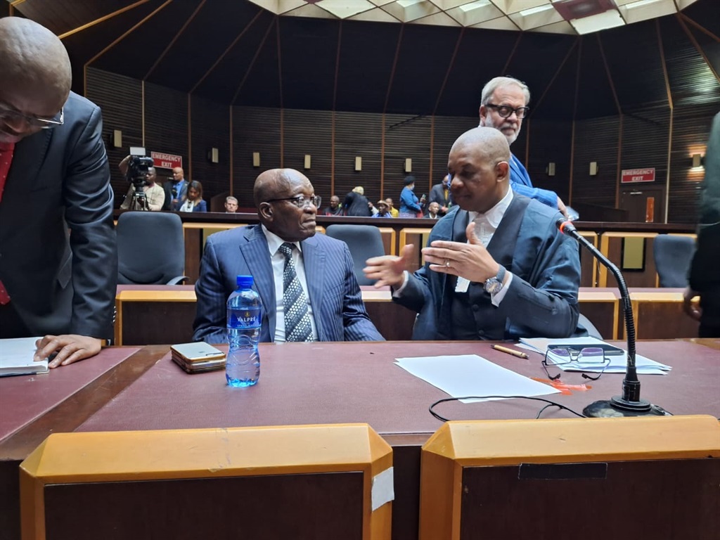 Former president Jacob Zuma and his advocate Dali Mpofu are seen in discussion ahead of a hearing on 4 August 2023, in Zuma's private prosecution case. Zuma instituted a private prosecution against News24 specialist journalist Karyn Maughan and NPA prosecutor Billy Downer.