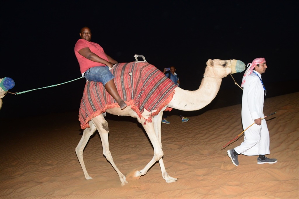 The author tries a camel ride. Pictures: Supplied