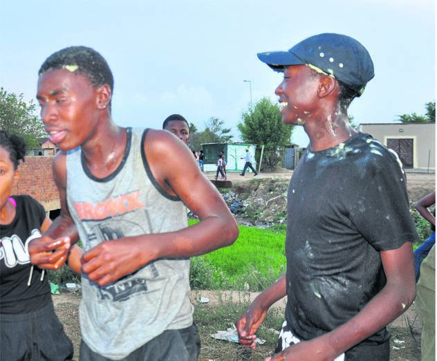 A group of young people poured custard all over each other.      Photo by Kabelo Tlhabanelo.