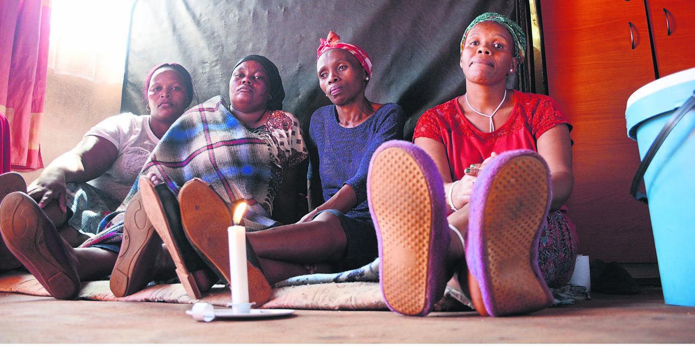 From left: Sindiswa Noko, Nosephelele Tatsi, Nomawabo Mtotoba and Ntombi Cici are mourning the death of Phikolomzi Tatsi.                                                  Photo by Muntu Nkosi