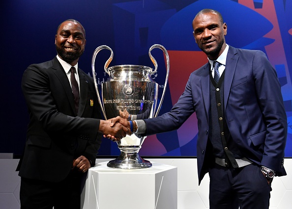 Manchester United Club Ambassador Andrew Cole (L) and Barcelona Director of Football Eric Abidal with the trophy following the UEFA Champions League 2018/19 Quarter-final, Semi-final and Final draws at the UEFA headquarters