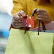 Surging demand for credit cards, clothing accounts - but unpaid debts improve