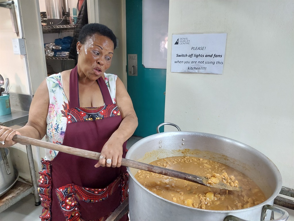 Tracey Bolt prepares a meal with a smile at the De