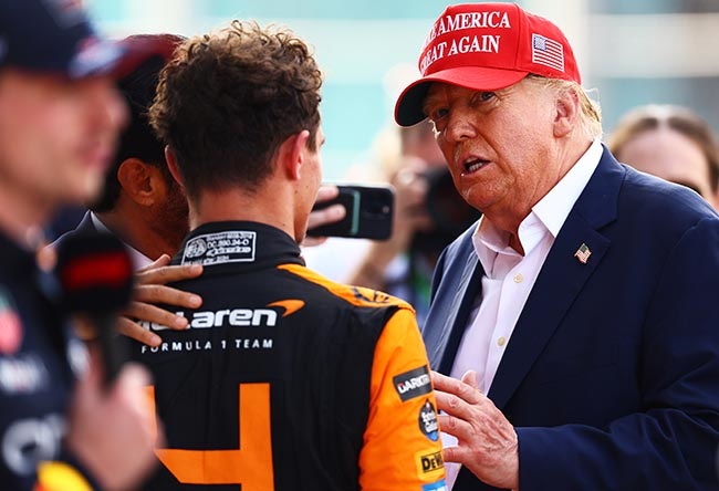 Donald Trump talks with race winner Lando Norris after the Miami Grand Prix at Miami International Autodrome on 5 May 2024. (Mark Thompson/Getty Images)