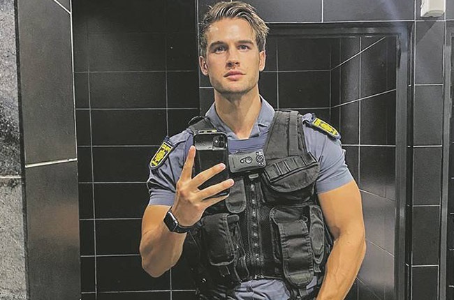 Devan Cox: SA's hot cop in hot water after sexy selfies
