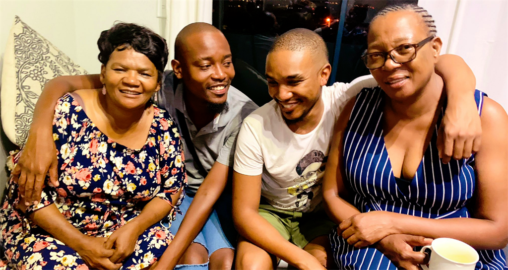 Moshe and Phelo with their moms. 