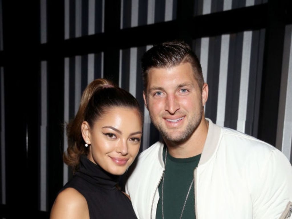 Demi-Leigh Nel-Peters and Tim Tebow attend DIRECTV Super Saturday Night 2019 at Atlantic Station on February 2, 2019 in Atlanta, Georgia.