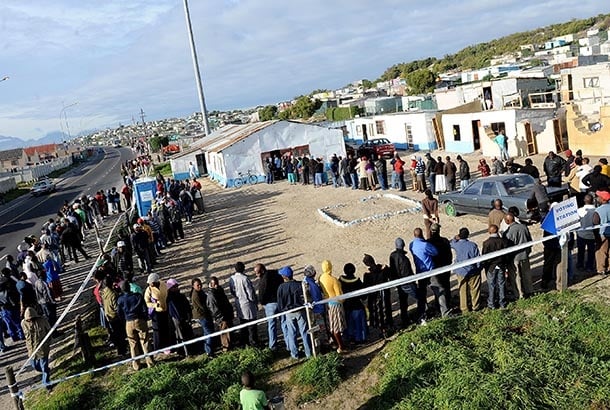 South African residents stand in long queues in Cape Town, South Africa on 18 May 2011 to cast their votes in the municipal elections. (Photo by Gallo Images/Foto24/Lulama Zenzile)