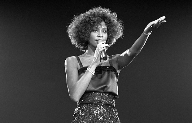 Whitney Houston performing at the Wembley Arena. (Getty Images)