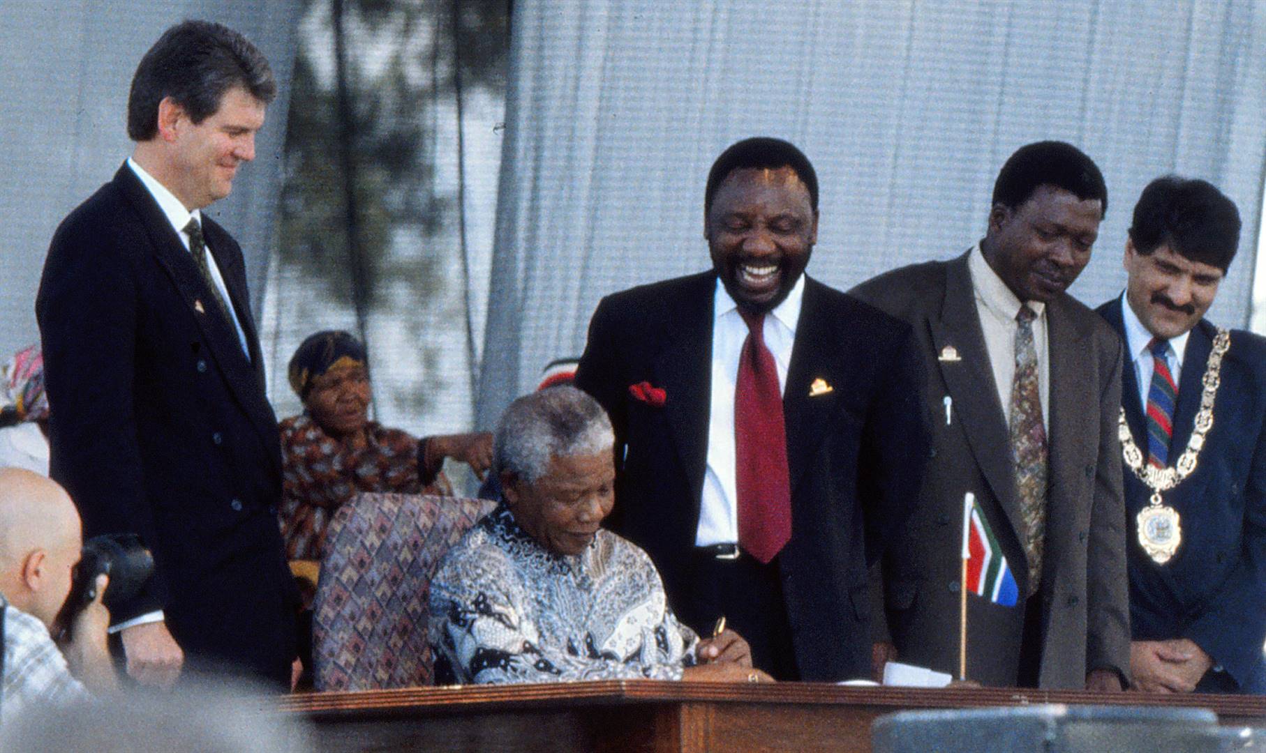 Nelson Mandela and Cyril Ramaphosa during the signing of the constitution 15 years ago (Adopting the constitution) Picture: Media24