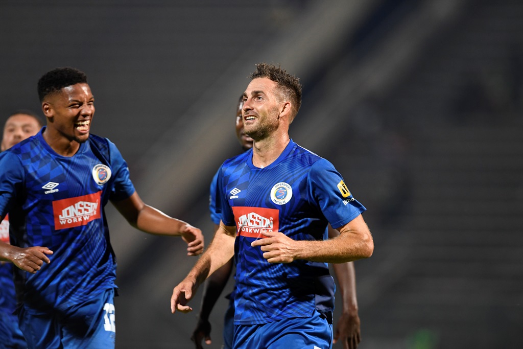 PRETORIA, SOUTH AFRICA - FEBRUARY 24:  Bradley Grobler of SuperSport United celebrates his 100th goals with Jamie Webber