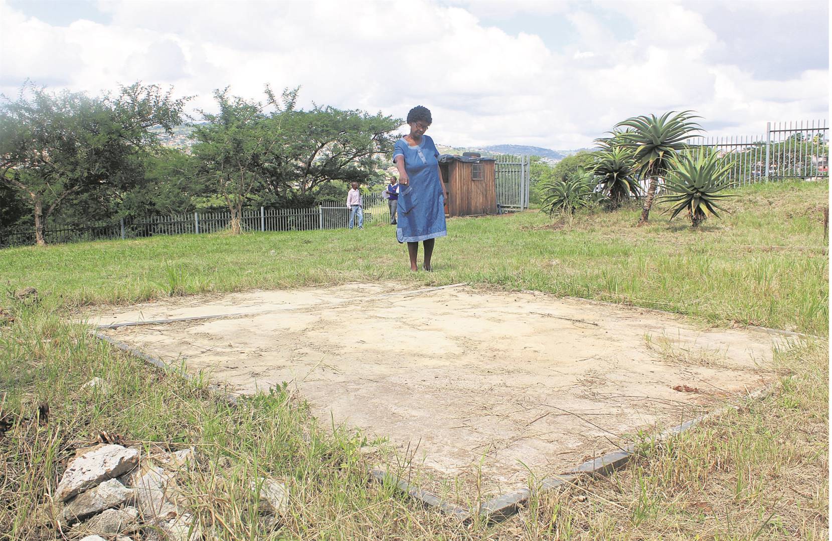 Thuthukile Mabhida shows what remains of her father’s grave at Heroes Acre.Photo by Mawande Dlali
