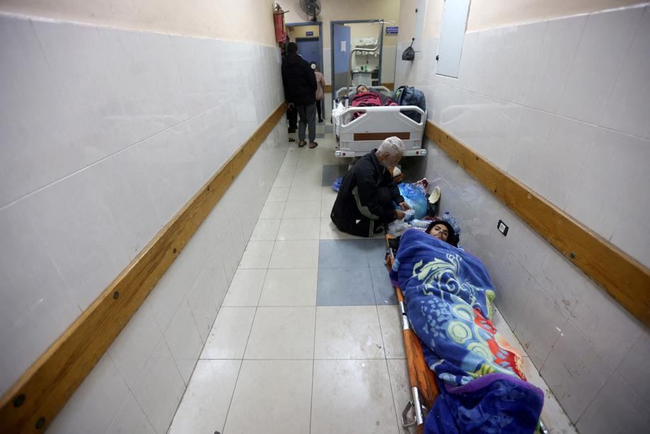 Palestinians wounded in an Israeli strike lie in corridor at Nasser hospital in Khan Younis in the southern Gaza Strip 12 January. Reuters/Ahmed Zakot/ File Photo/File Photo