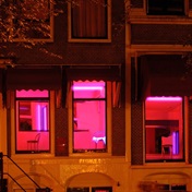 Amsterdam sex workers protest plans to close its centuries-old red light district