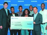 Sung Yoon, CEO of Samsung Africa (right) with recipients, at the launch of the study bursaries the company provides.