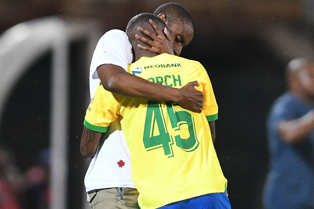 Thembinkosi Lorch of Mamelodi Sundowns celebrates his goal with coach Rulani Mokwena during the Nedbank Cup, Last 16 match between Mamelodi Sundowns and Maritzburg United at Lucas Masterpieces Moripe Stadium in Pretoria on March 17, 2024 in Pretoria, South Africa. 