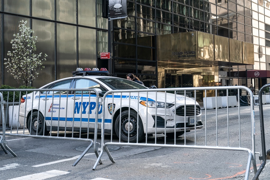 Trump Tower is circled with barriers as security forces take measures ahead of former US President Donald Trumps arrival for a court hearing in New York on 3 April. (Photo by Lev Radin/Anadolu Agency via Getty Images)