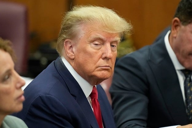 Former US President Donald Trump appears in a Manhattan court during his arraignment on April 4, 2023, in New York City. Trump was arraigned during his first court appearance today following an indictment by a grand jury that heard evidence about money paid to adult film star Stormy Daniels before the 2016 presidential election. With the indictment, Trump becomes the first former US president in history to be charged with a criminal offence.   Seth Wenig-Pool/Getty Images/AFP (Photo by POOL / GETTY IMAGES NORTH AMERICA / Getty Images via AFP)
