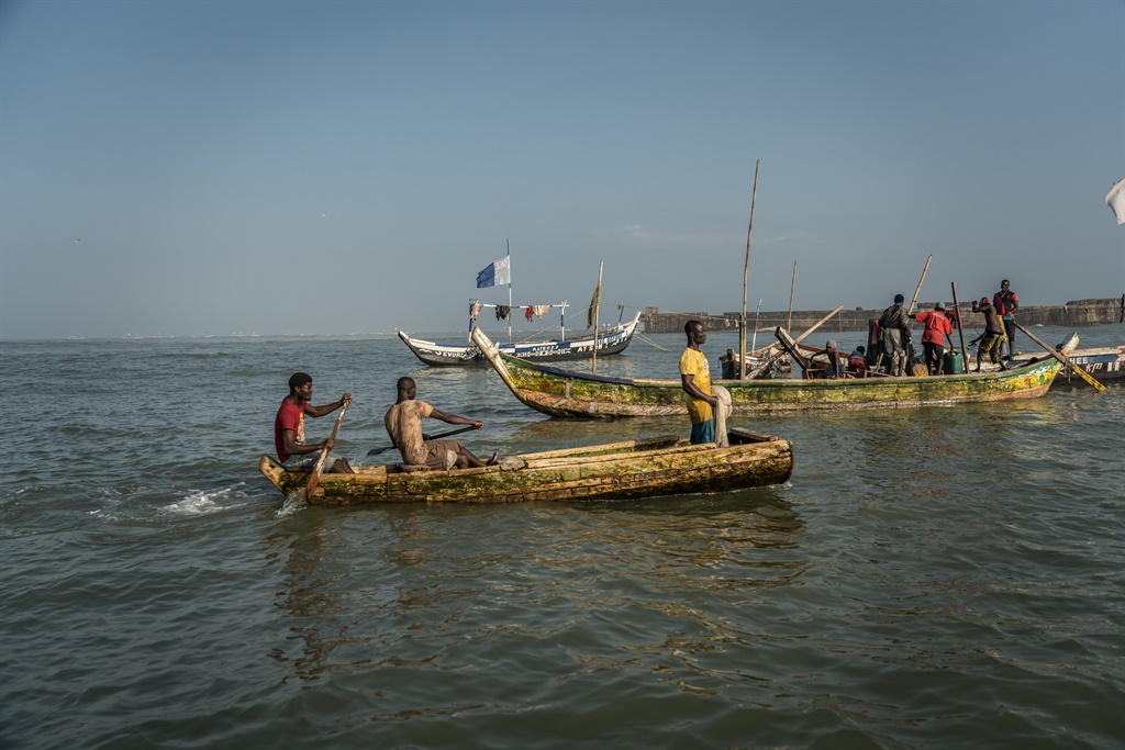 Fishermen in the waters of the Gulf of Guinea, outside Jamestown, the oldest fishing community in Accra on July 21, 2019.