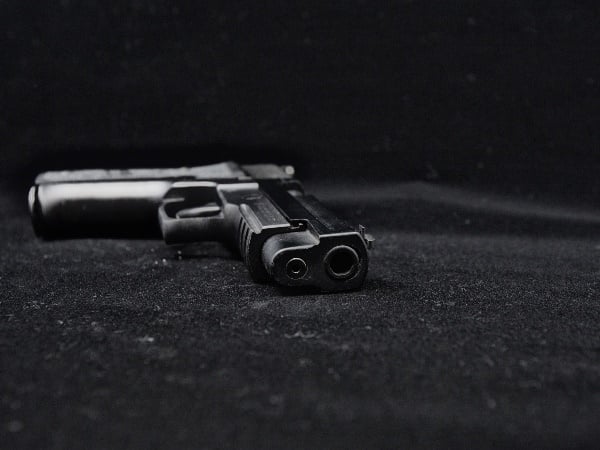 A KZN police detective pleaded guilty to mistakenly shooting dead a senior prosecutor with an exhibit firearm.