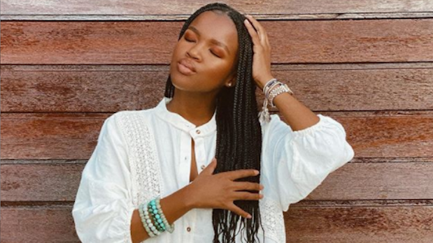 Influencer Melody Molale displays her newly self-braided waist-length box braids