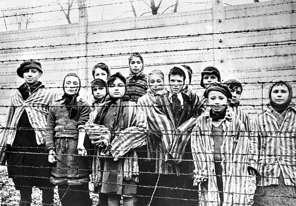 A group of children at Auschwitz-Birkenau on January 27, 1945, the day they were freed. (Alexander Vorontsov, Galerie Bilderwelt, Getty Images)