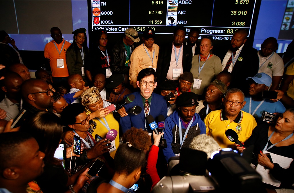 Members of various small political parties brief the media at the IEC results operations centre in May 2019.