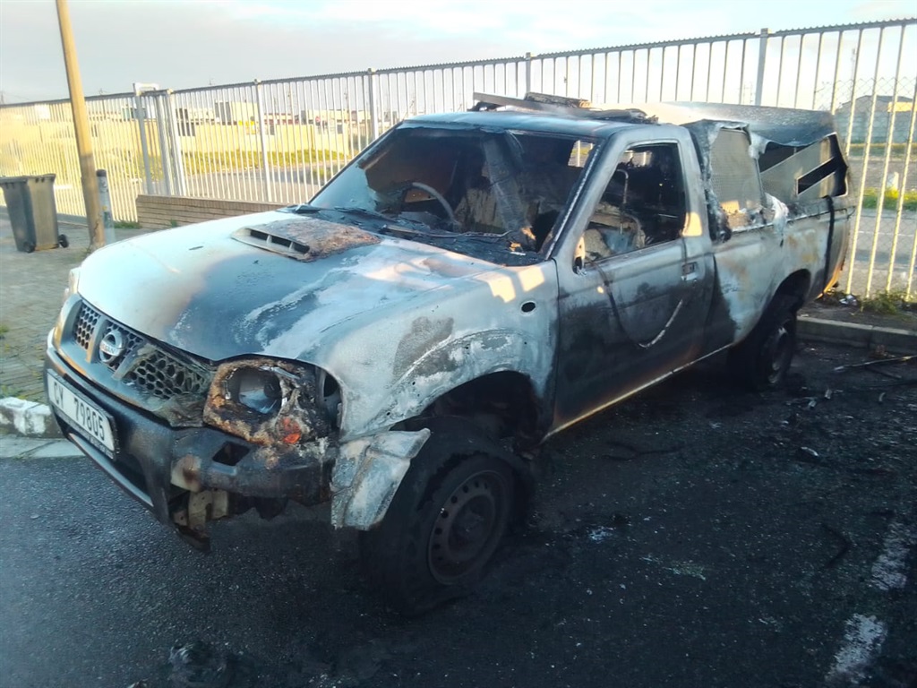 A City of Cape Town vehicle depot was petrol bombed earlier on Sunday morning, 6 August. Photo by Lulekwa Mbadamane