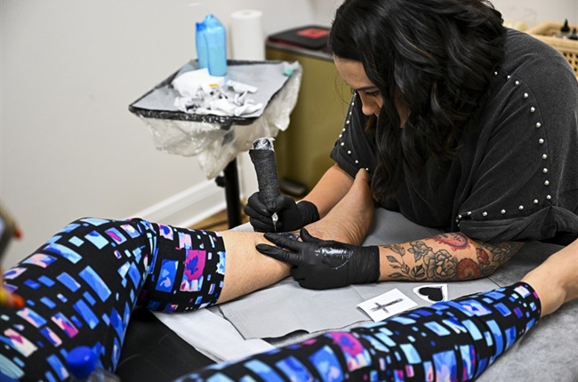 Tattoos and transformation: Human trafficking survivor heals others